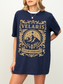 woman in a navy shirt with tan Velaris City of Starlight design inspired by ACOTAR fantasy book series

