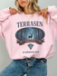 woman wearing a pink vintage terrasen sweatshirt with erilea banner and stag illustration